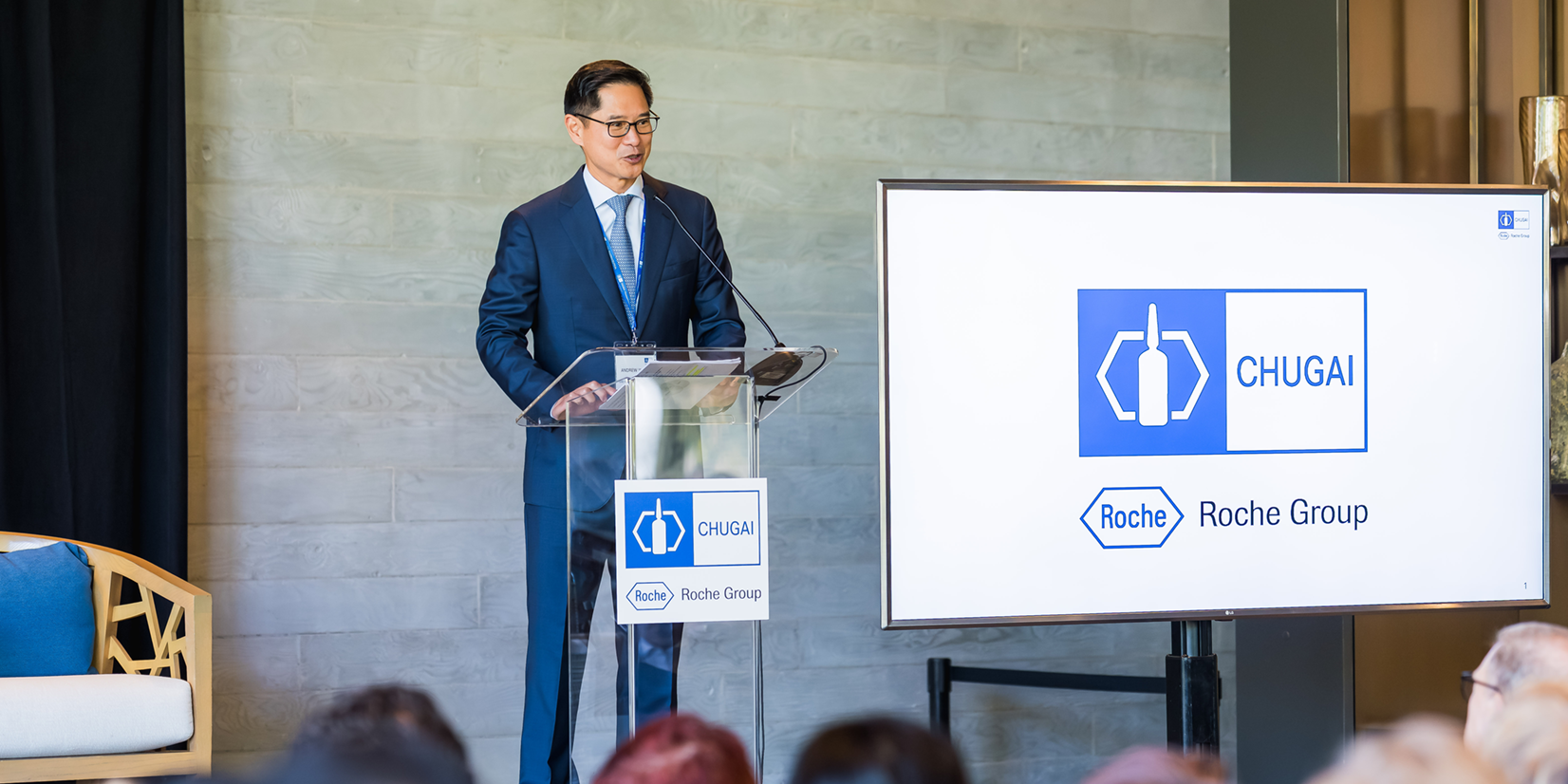 Andrew Wong, moderates the Bay Area opening ceremony for Chugai’s U.S. Partnering Office.